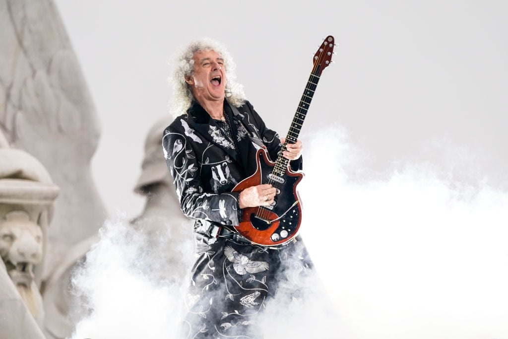 LONDON, ENGLAND - JUNE 04: Brian May of Queen performs during the Platinum Party At The Palace at Buckingham Palace on June 4, 2022 in London, England. The Platinum Jubilee of Elizabeth II is being celebrated from June 2 to June 5, 2022, in the UK and Commonwealth to mark the 70th anniversary of the accession of Queen Elizabeth II on 6 February 1952. (Photo by Alberto Pezzali - WPA Pool/Getty Images)