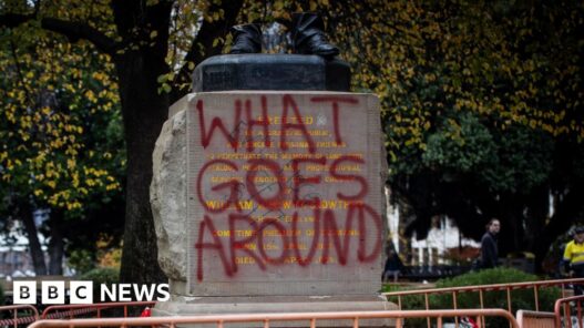 A severed statue divides an Australian city