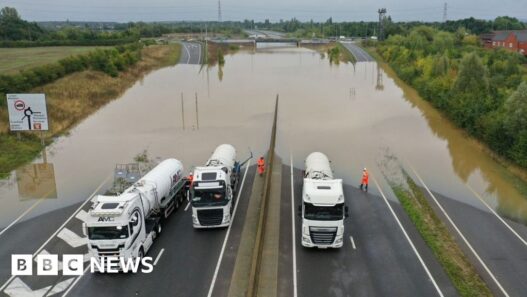 Flash floods and travel disruption as heavy rain falls overnight