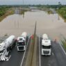 Flash floods and travel disruption as heavy rain falls overnight