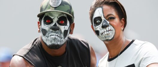 Raiders, Chargers Fans Get Into Crazy Brawl That Sees One Man Bloodied And A Woman Getting Bodyslammed