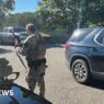 Schools closed amid hunt for gunman