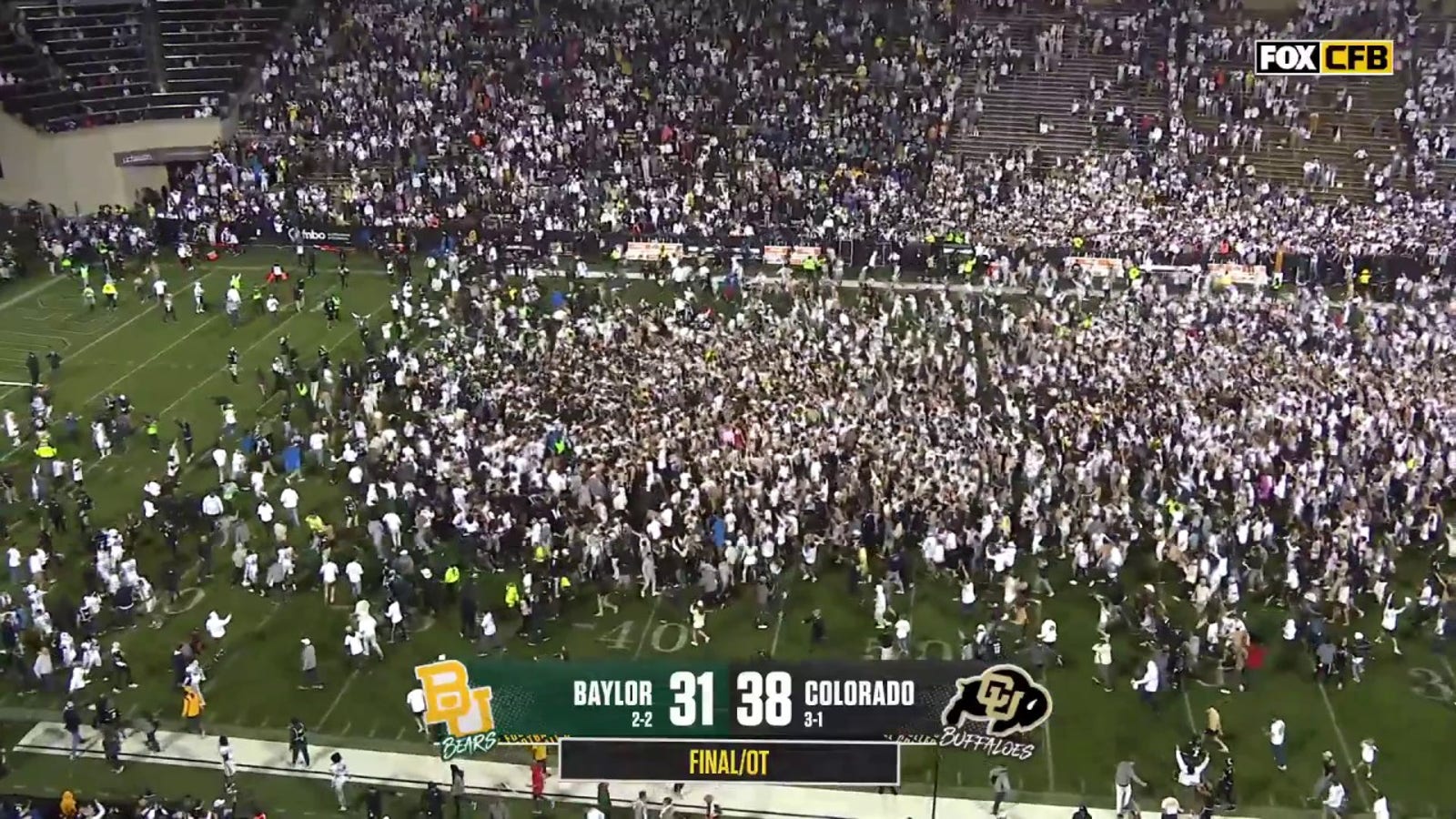 Fans storm the field after Travis Hunter helps Buffs top Baylor in OT 