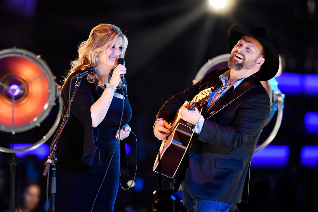 LOS ANGELES, CA - FEBRUARY 08: Trisha Yearwood and Garth Brooks perform onstage during MusiCares Person of the Year honoring Dolly Parton at Los Angeles Convention Center on February 8, 2019 in Los Angeles, California. (Photo by Frazer Harrison/Getty Images)