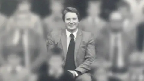 Buchanan & Co Limited Former head teacher Neil Foden pictured in a school photograph in the 1980s.