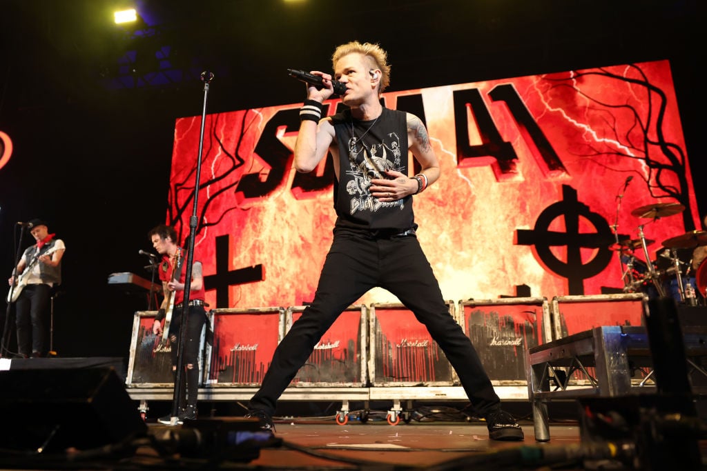 ANAHEIM, CALIFORNIA - JANUARY 13: (FOR EDITORIAL USE ONLY) Deryck Whibley of Sum 41 performs onstage at the 2024 iHeartRadio ALTer EGO Presented by Capital One at the Honda Center on January 13, 2024 in Anaheim, California. (Photo by Rich Polk/Getty Images for iHeartRadio)