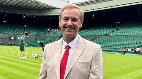 David Bayliss David Bayliss standing at Wimbledon