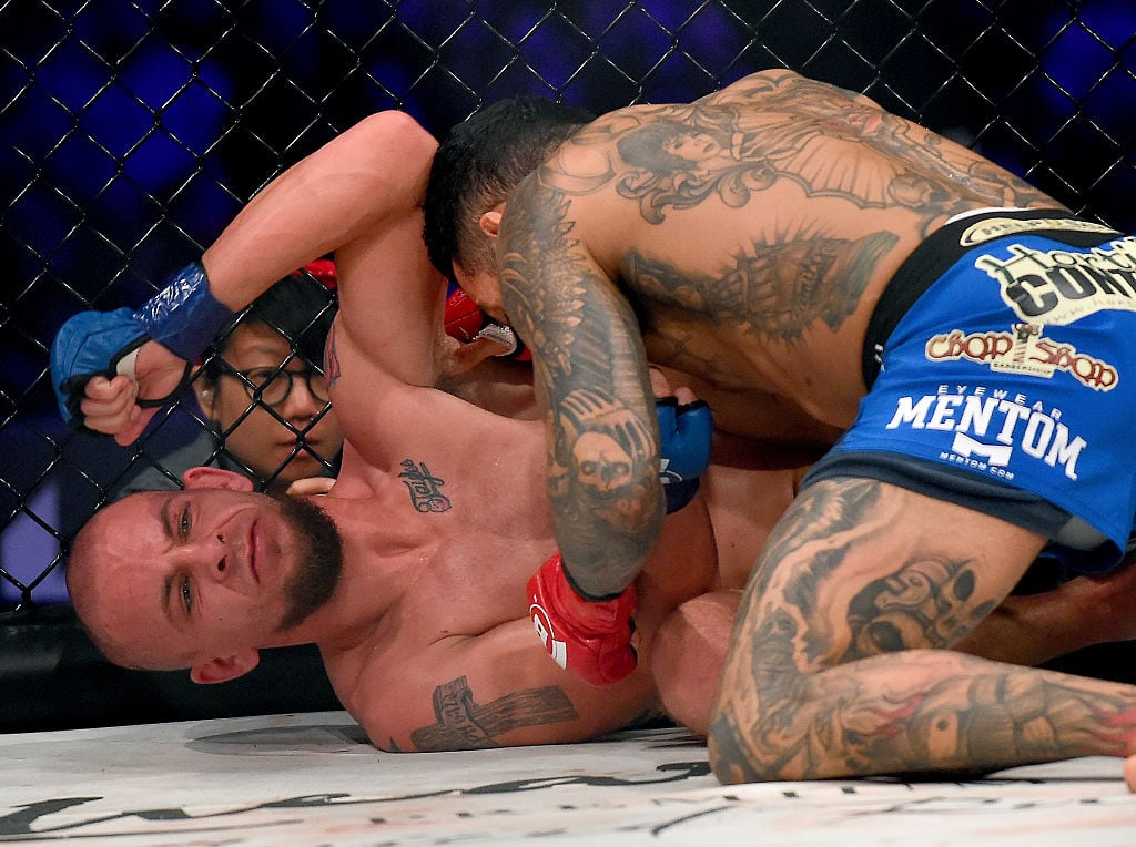 INGLEWOOD, CA - JANUARY 21: John Mercurio (blue gloves) and Guilherme Bomba (red gloves) during their Bellator welterweight fight at The Forum on January 21, 2017 in Inglewood, Califonia. Guilherme Bomba won by knockout. (Photo by Jayne Kamin-Oncea/Getty Images)