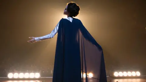 Studio Canal Angelina Jolie in Maria, pictured singing to an audience in a theatre