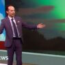 BBC weather presenter Calum MacColl bursts into song live on air