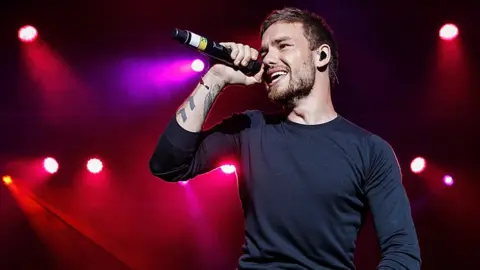 Getty Images Liam Payne singing on stage