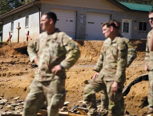 Helpers prevailing amid the flood