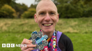 Marathon runner secures world record after completing global challenge