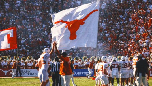 Texas players plant flag through Baker Mayfield Oklahoma jersey following win