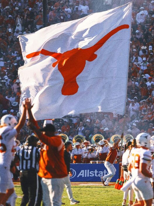 Texas players plant flag through Baker Mayfield Oklahoma jersey following win