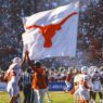 Texas players plant flag through Baker Mayfield Oklahoma jersey following win