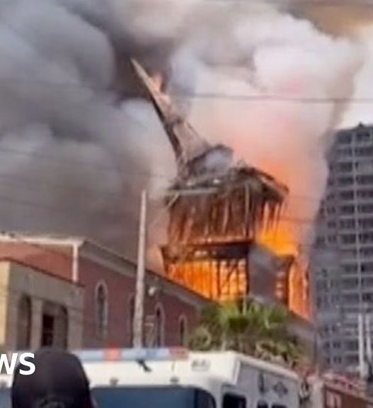 Tower falls as historic San Francisco Church destroyed by fire