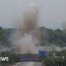 Watch moment North Korea blows up roads connecting to South Korea